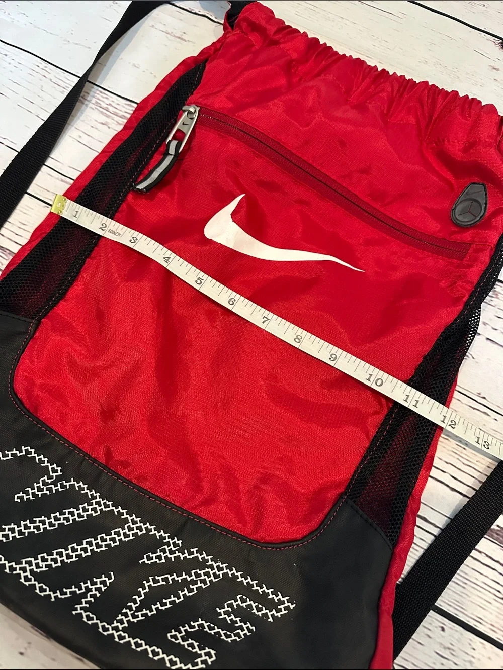 Nike Red and Black Drawstring Backpack with White Swoosh